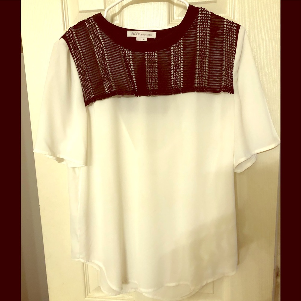 BCBG white top with black mesh neckline